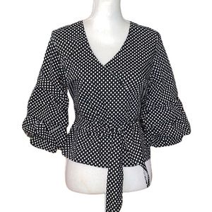 Star Style Polkadot black and white mock wrap around embellished sleeve top
